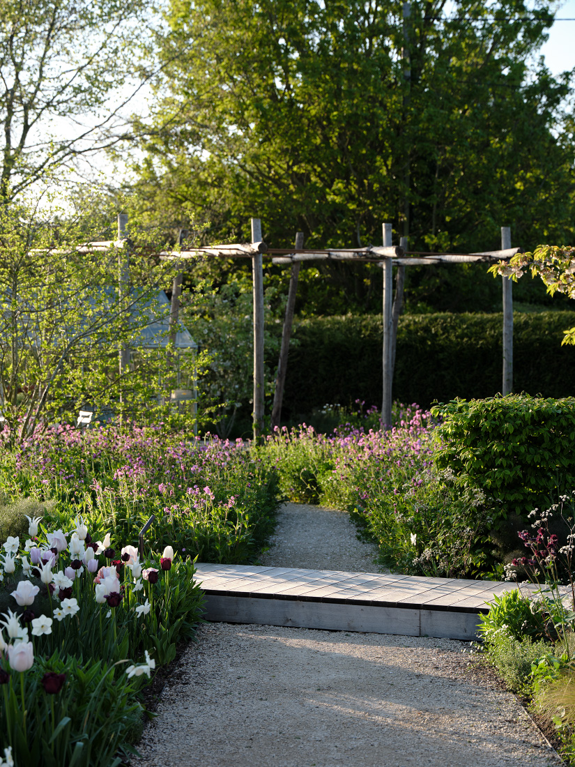 Local hop farms inspire a chestnut pergola