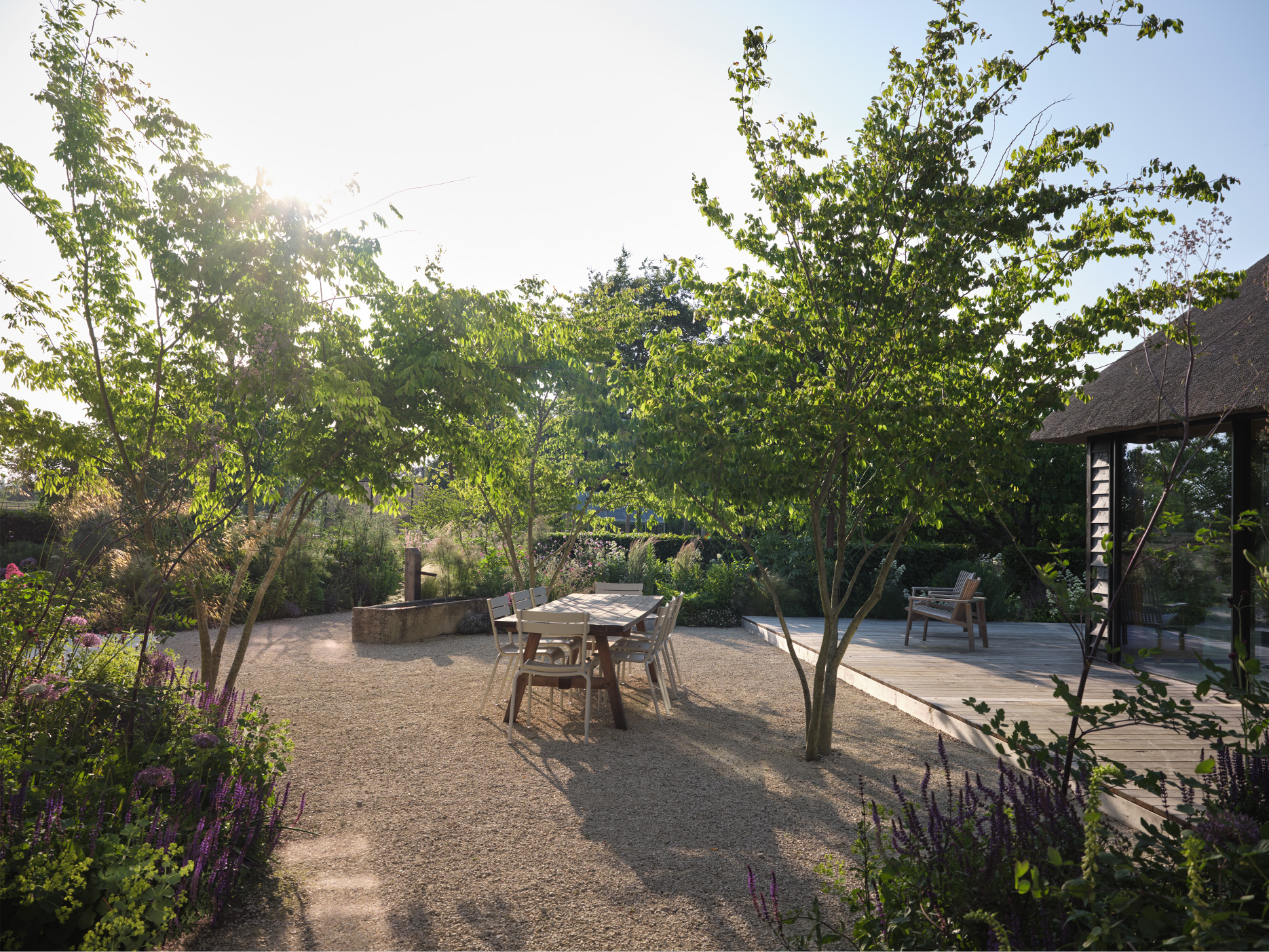 A sunken dining courtyard extends the barn's kitchen