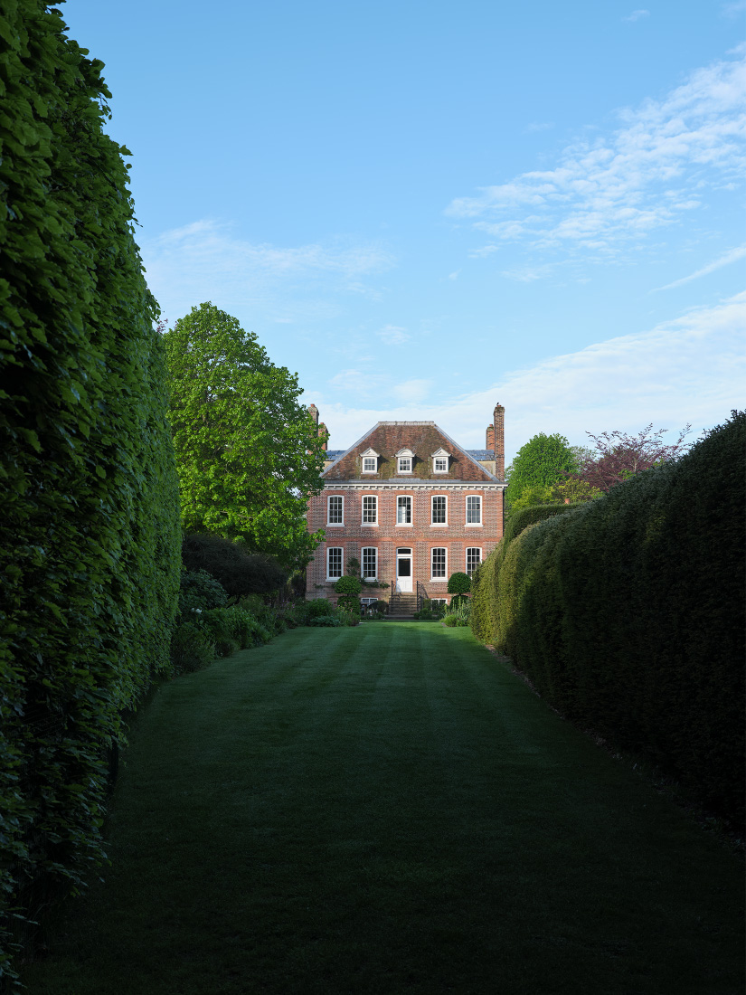 A Queen Anne home framed in green