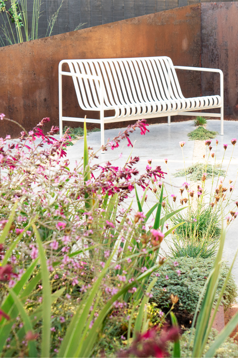Painterly planting compliments weathered Corten